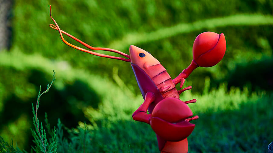 Rincón del laberinto con detalles de diseño inspirados en la historia de Alicia en el País de las Maravillas en Disneyland Paris.